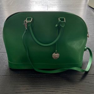 Publicati green purse. Never worn. New condition.